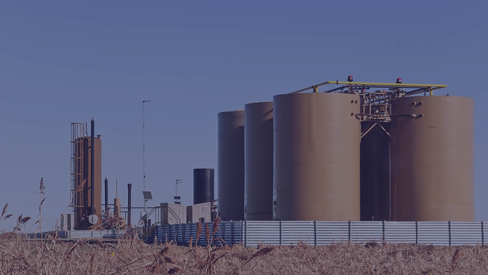 Oil production tanks in field
